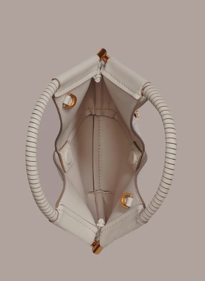 Laser-cut leather mini crossbody bag